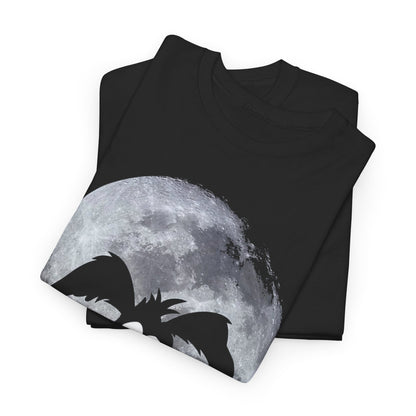 Chic folded black t-shirts displaying Wile E. Coyote's silhouette with a captivating moon backdrop, perfect for fashion-forward individuals.