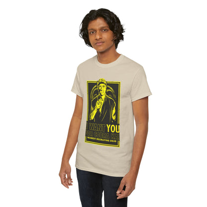 Elegant unisex Cobra Kai graphic T-shirt on a model, showcasing a light beige colour with a striking design. 'I WANT YOU FOR COBRA KAI' text adds a playful touch, making it a fashionable statement piece for enthusiasts.