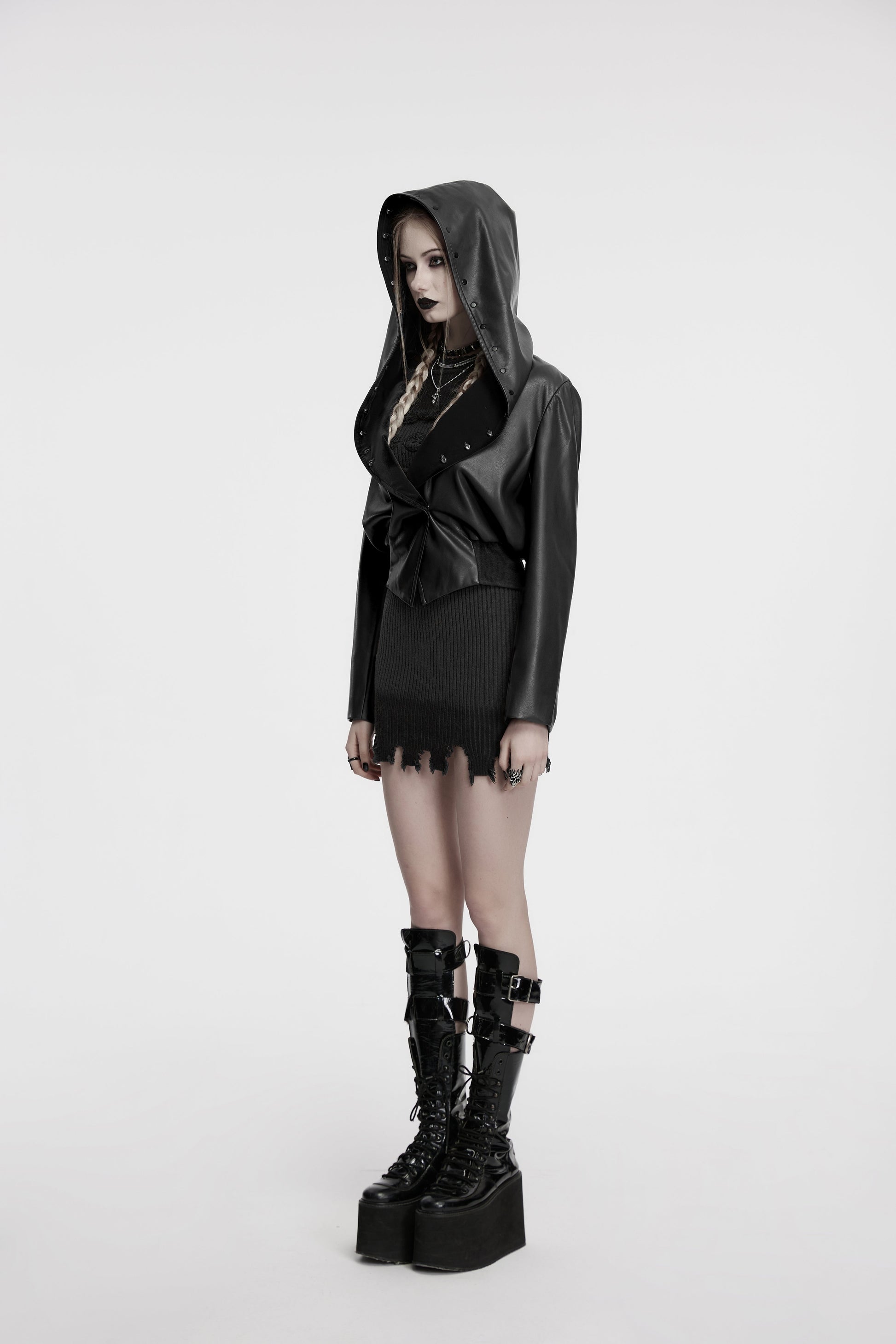 Model wearing the Punk Rave Nyx Hooded Faux Leather Jacket layered over a stylish outfit, showcasing its versatility and modern gothic appeal.