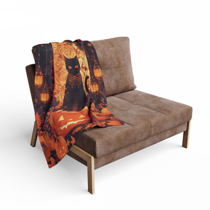 Decorative and Warm Halloween Spooky Arctic Fleece Blanket draped over a stylish couch, featuring a beautiful illustration of a black cat among pumpkins and lanterns, perfect for festive autumn decor.