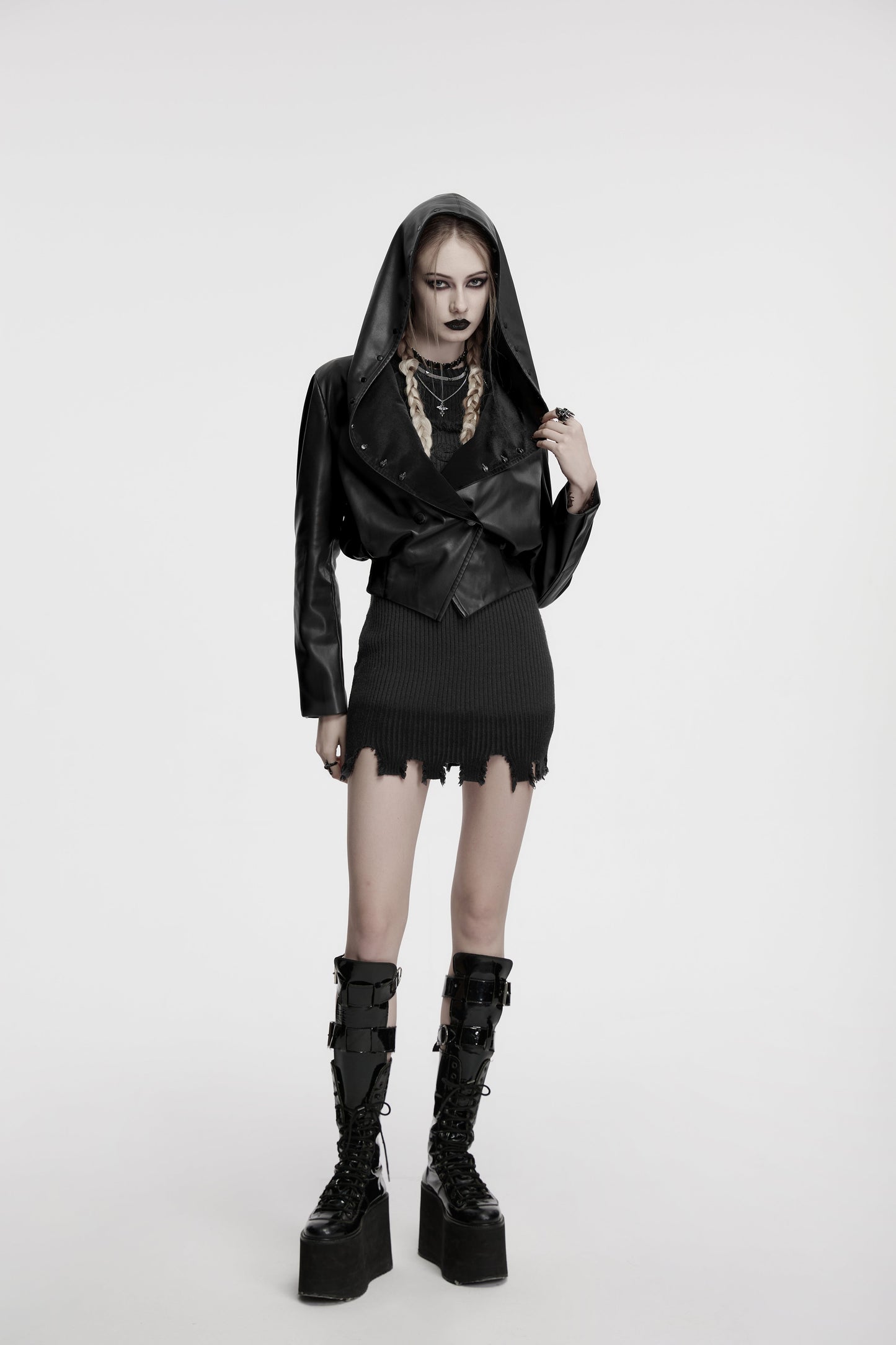 The dramatic large lapels of the Punk Rave Nyx Hooded Jacket displayed against a textured background, emphasizing its bold and edgy design.