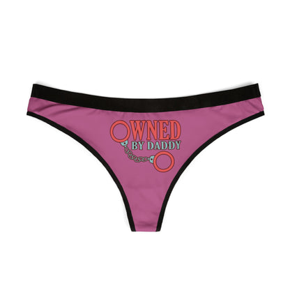 Elegant pink women's thong showcasing 'Owned by Daddy' graphic design, perfect for cheeky gifting and intimate moments.