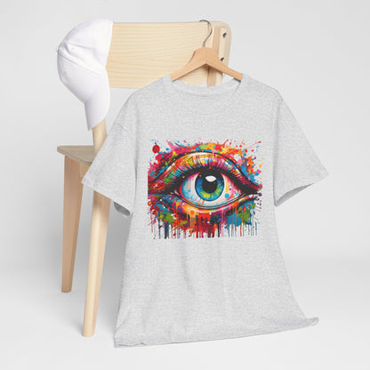 Stylish grey t-shirt adorned with a vibrant eye graphic, complemented by a trendy white cap on a wooden chair, representing contemporary art and fashion.