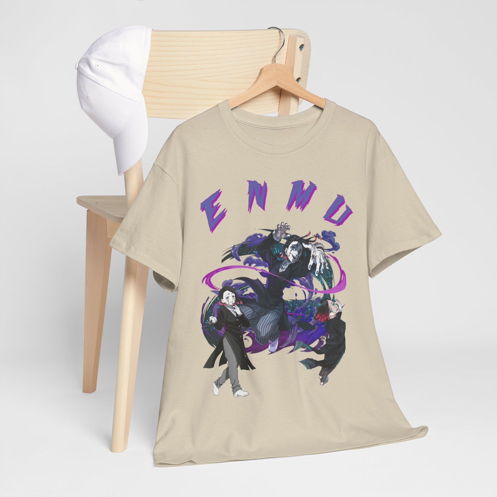 Sophisticated Enmu graphic t-shirt displayed on a wooden chair with a cap, illustrating premium anime artwork and bold design for fashion-forward fans.