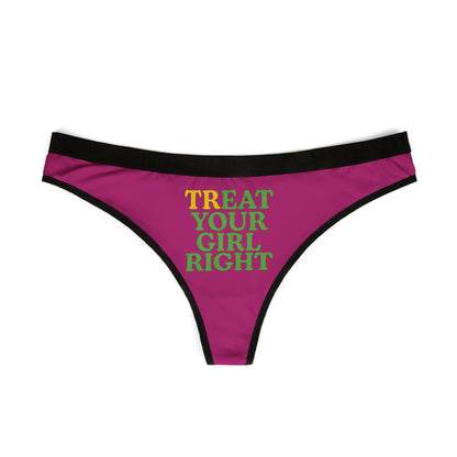 Elegant view of a women's thong in rich pink with striking black trim, displaying the humorous phrase 'Treat Your Girl Right' in eye-catching typography.