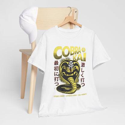 Artfully styled white Cobra Kai t-shirt paired with a chic cap, highlighting a striking snake graphic, a perfect blend of elegance and martial arts flair.