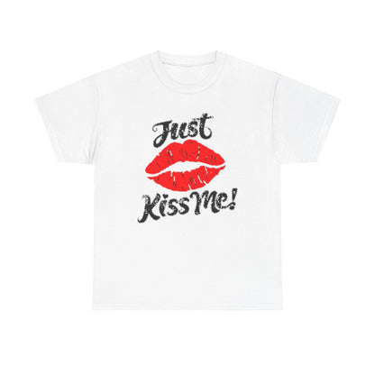 Elegant white t-shirt designed for both men and women, showcasing the cheeky graphic 'Just Kiss Me!' complemented by a striking red lip print, an ideal choice for making a bold statement.