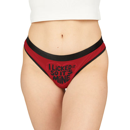 Elegant red women's thong featuring a cheeky graphic that says 'I Licked It So It’s Mine', embodying playful luxury for Valentine's Day.