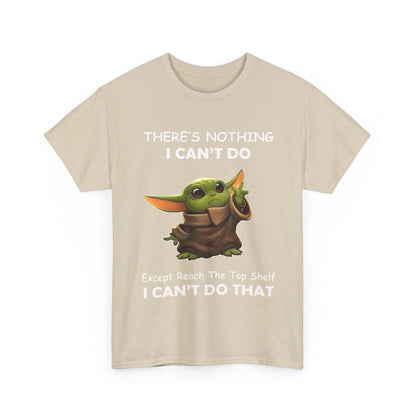 Grogu, The Child, Baby Yoda Mandalorian Humorous Graphic Unisex Tee Shirt with the phrase 'THERE'S NOTHING I CAN'T DO, Except Reach The Top Shelf, I CAN'T DO THAT' elegantly displayed.