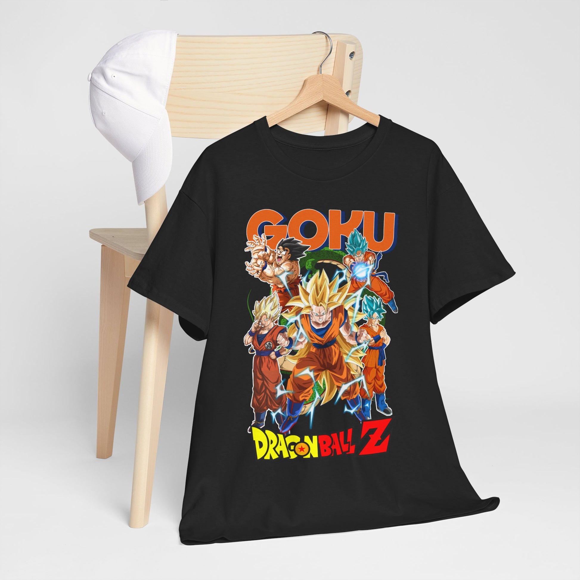 Sophisticated GOKU Dragon Ball Z T-shirt styled with a cap on a chair, showcasing its high-quality graphic design and casual elegance, perfect for any casual outfit.