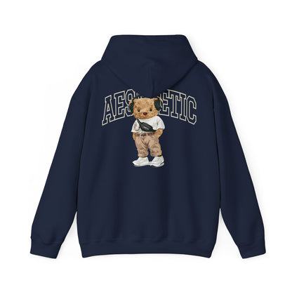 Luxurious navy hoodie adorned with a playful teddy bear illustration, showcasing a fashionable streetwear aesthetic.