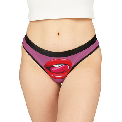 Elegant women's thong featuring a bold graphic of luscious red lips and a playful pink tongue, perfect for adding a touch of cheekiness to any romantic occasion.