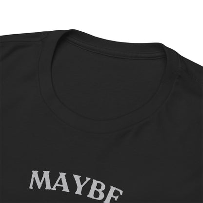 Close-up of a black Maybe Tomorrow T-shirt's neckline, highlighting the luxurious fabric and sophisticated light grey text of 'MAYBE Tomorrow'.