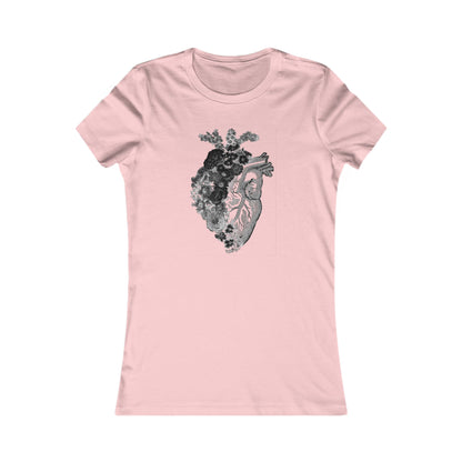 Elegant women’s graphic t-shirt featuring a vintage anatomical heart design entwined with intricate floral elements against a soft pink background, perfect for expressing a unique sense of style.