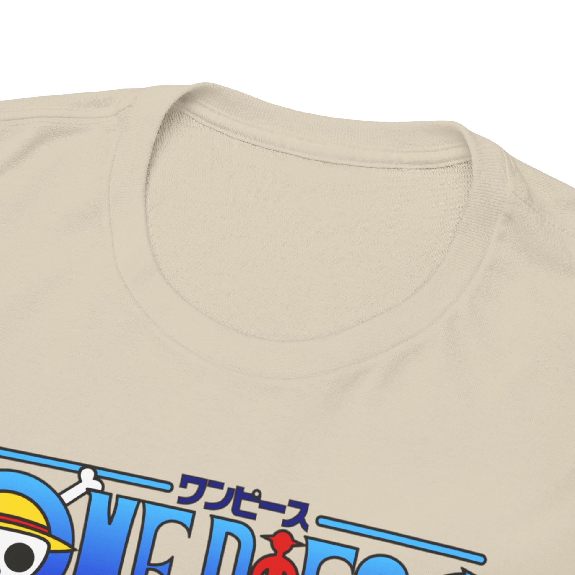 Close-up view of the soft fabric and luxurious neckline of a men's t-shirt, featuring striking anime-themed graphics of Nami from One Piece.