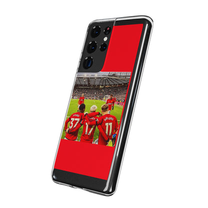 Manchester United Mainoo Garnach Hojlund Soft Phone Case showcasing players in red jerseys, elegantly designed for soccer fans.