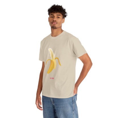 Man exuding confidence wearing the 'Pixelated Banana' graphic t-shirt, featuring a playful design, paired with denim for a chic, casual look.