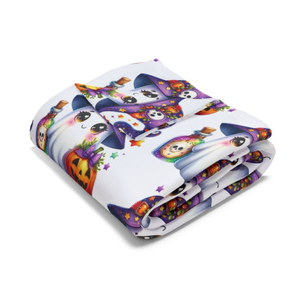 Luxurious Decorative and Warm Halloween Cute Arctic Fleece Blanket featuring whimsical ghosts and pumpkin designs, perfect for adding charm to your seasonal decor.