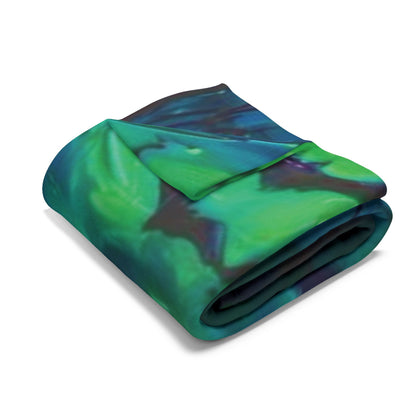 Decorative and Warm Halloween Spooky Arctic Fleece Blanket elegantly folded displaying a rich, deep green and blue colour scheme, bringing warmth and style to your Halloween celebrations.