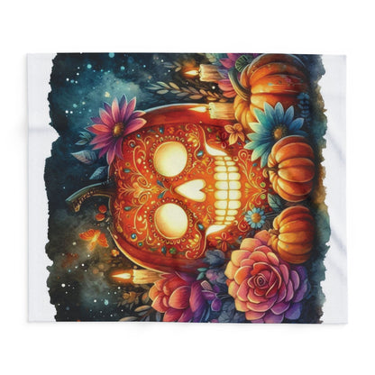 Sophisticated Decorative and Warm Halloween Spooky Arctic Fleece Blanket displayed on a tastefully decorated bed, showcasing a charismatic skull surrounded by autumnal blooms and pumpkins.