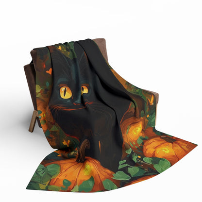 Decorative and Warm Halloween Spooky Arctic Fleece Blanket elegantly draped over a chair, displaying a charming black cat and pumpkins, perfect for enhancing your Halloween atmosphere.