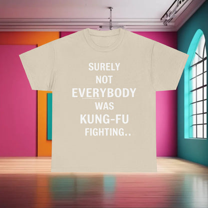 Chic beige Cotton Tee displaying the phrase 'Surely Not Everybody Was Kung Foo Fighting' in prominent white text. This sophisticated graphic t-shirt offers a blend of humour and high fashion.