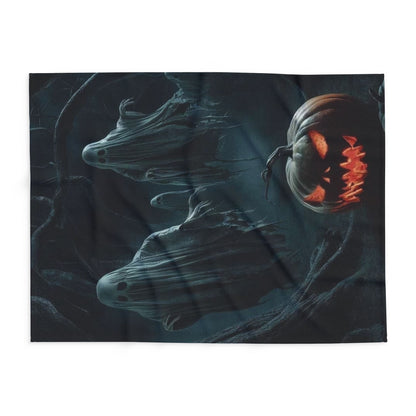 Luxurious Decorative and Warm Halloween Spooky Arctic Fleece Blanket featuring ghostly figures and a radiant jack-o'-lantern design, perfect for adding seasonal charm.