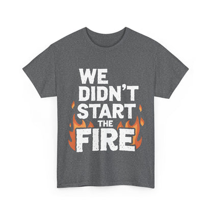 Elegant grey We Didn't Start the Fire graphic t-shirt with striking white lettering and orange flames, an ideal addition to trendy wardrobes.