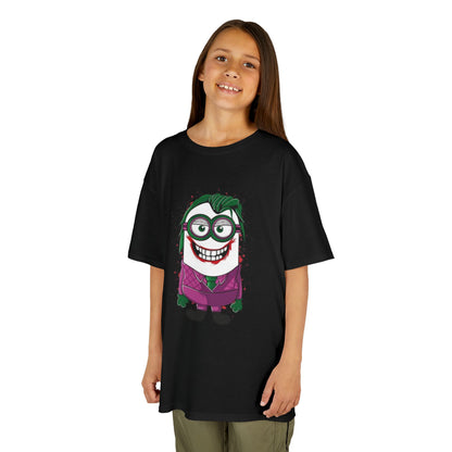 A young girl wearing a Minions Joker T-Shirt featuring a mischievous Minion as the Joker. This funny tee is perfect for kids who love Minions and is an ideal addition to any young fan's wardrobe.