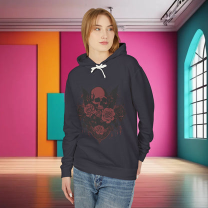 Front view of a woman displaying the Unisex Lightweight Hooded Sweatshirt with a unique designer skull and roses graphic, complemented by a chic and colourful setting.