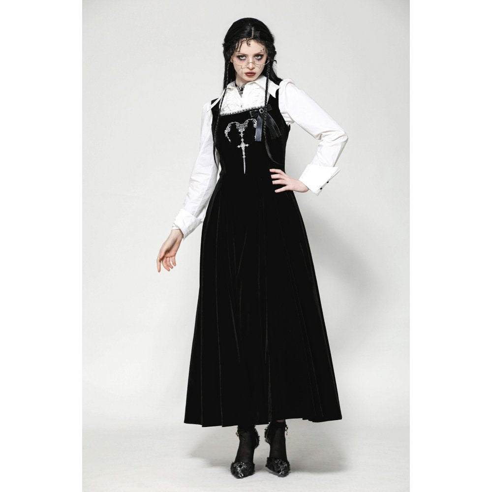 Close-up view of the intricate horn embroidery on the Dark In Love Lux Black Velvet Maxi Dress highlighting luxurious details.