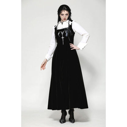 Close-up view of the intricate horn embroidery on the Dark In Love Lux Black Velvet Maxi Dress highlighting luxurious details.