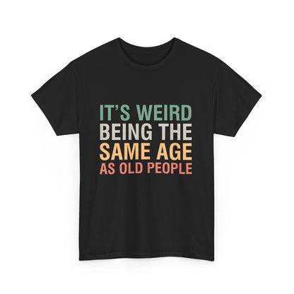 Chic graphic T-shirt in black displaying the wording 'It’s Weird Being The Same Age As Old People', perfect for a sophisticated casual look.
