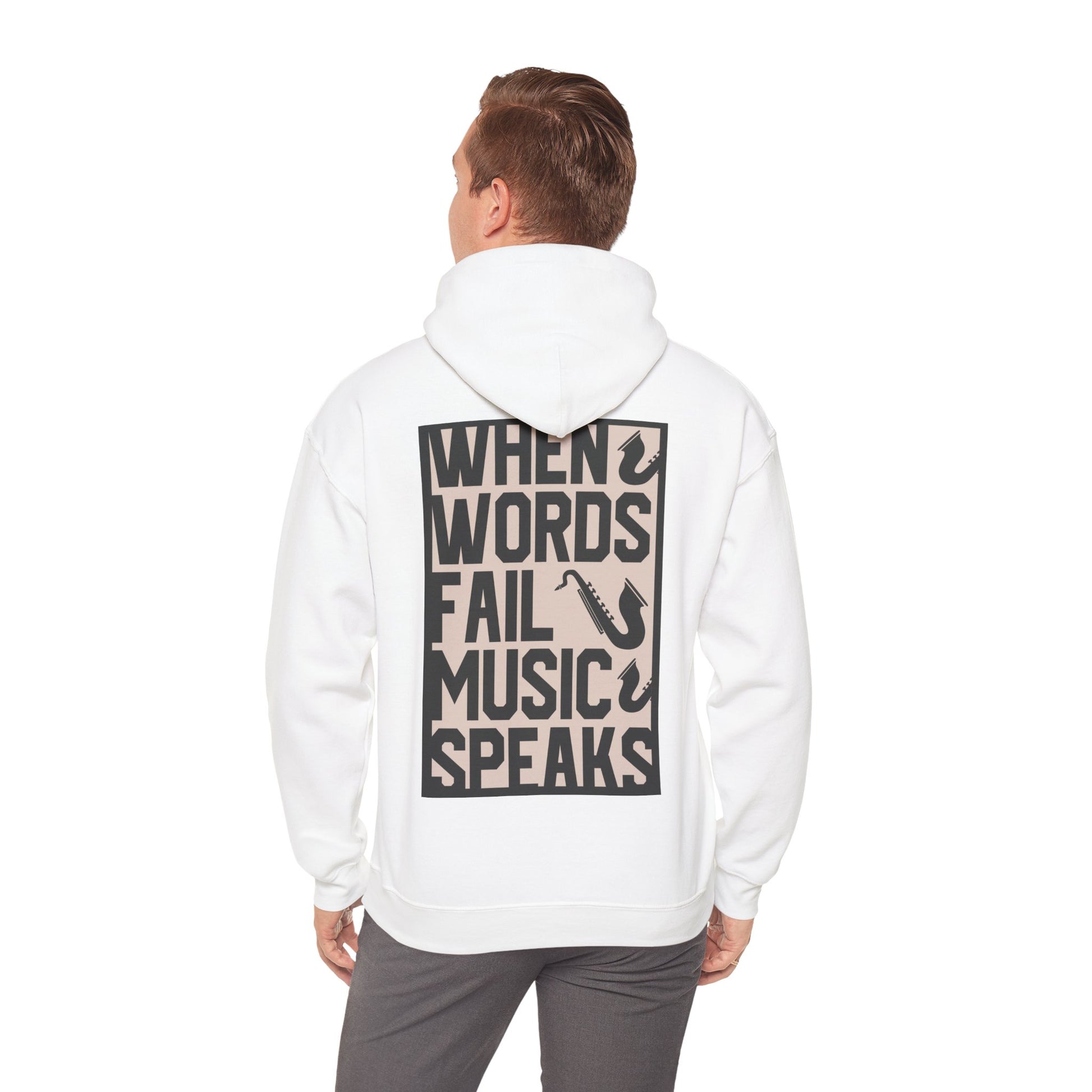 Elegant back view of a white hoodie featuring the inspirational quote 'WHEN WORDS FAIL MUSIC SPEAKS' with saxophone illustrations, perfect for music enthusiasts.