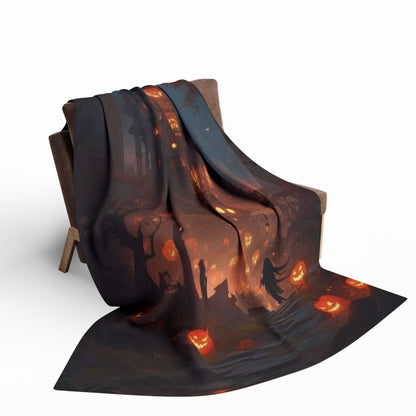 The Decorative and Warm Halloween Spooky Arctic fleece blanket cascading off an armchair, featuring a striking design with eerie Halloween motifs and glowing pumpkins.