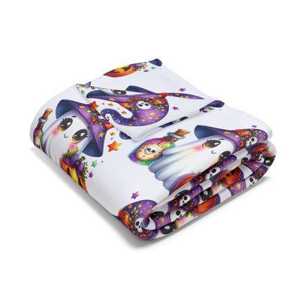 Decorative and Warm Halloween Cute Arctic Fleece Blanket folded artistically to reveal detailed ghost and Halloween motifs, enhancing your holiday decor.