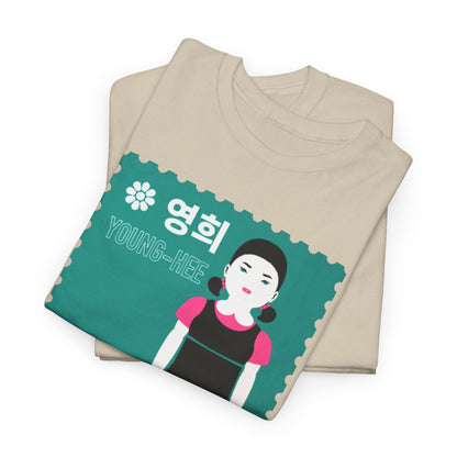 Chic unisex t-shirt elegantly folded, featuring a vibrant Young-Hee design from Squid Game, suitable for unique fashion expressions.