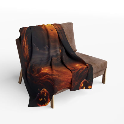 Sumptuous Decorative and Warm Halloween Spooky Arctic Fleece Blanket displayed casually on a chic armchair, enhancing the ambience of any Halloween-themed space.