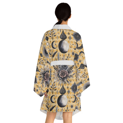 Back view of a woman in the Floral Kimono Robe, highlighting its luxurious design and perfect for chic relaxation.