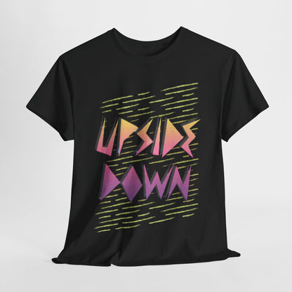 Stylish black unisex graphic t-shirt featuring a vibrant 'UPSIDE DOWN' design in pastel shades of orange, pink, and purple, perfect for fans of retro aesthetics and cosmic humour.