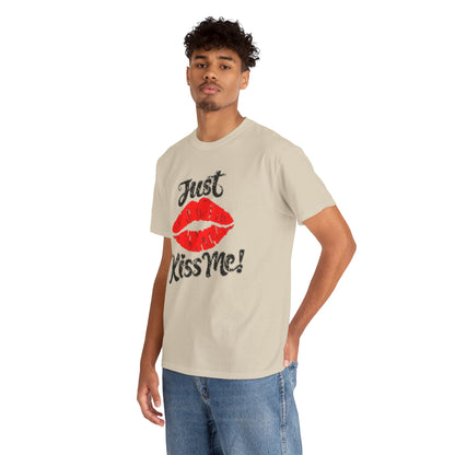 Fashion-forward male model wearing a luxury beige graphic tee that boasts a playful red lips design and the words 'Just Kiss Me!' in a stylish format.