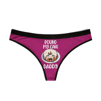 Stylish women's thong in rich purple showcasing a whimsical 'Pound My Cake' design, perfect for a humorous and luxurious intimate occasion.