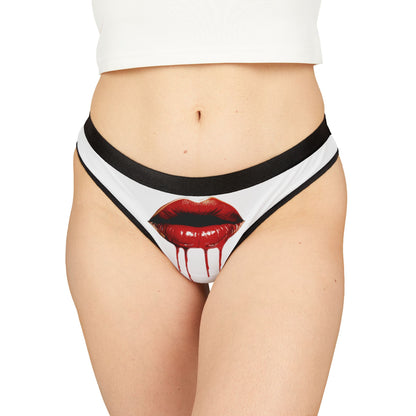 Luxurious cheeky women's thong featuring a provocative graphic of glossy red lips with dripping detail, ideal for playful romantic occasions.
