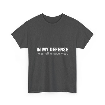 Front view of a sophisticated urban unisex t-shirt showcasing the statement 'In My Defence I Was Left Unsupervised', perfect for casual outings.