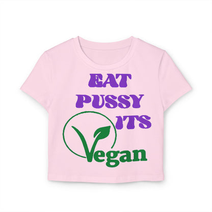 Sophisticated pink cropped t-shirt featuring a whimsical graphic design that playfully states 'EAT PUSSY ITS Vegan' in bold purple and green hues.
