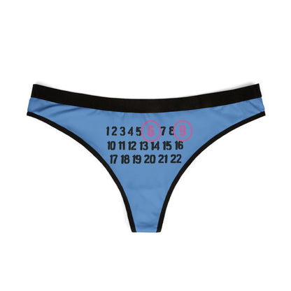 Elegant 69 thong displayed flat, showcasing its striking design with prominent numbers on a vibrant blue fabric.