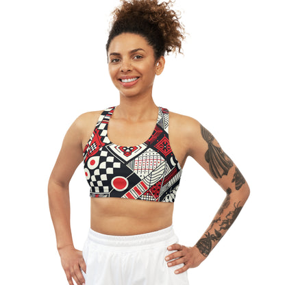 Valeria Belmonte Modern Patterned Sports Bra displayed on a fitness model, illustrating fashion-forward design and vibrant red hues perfect for high-intensity workouts.