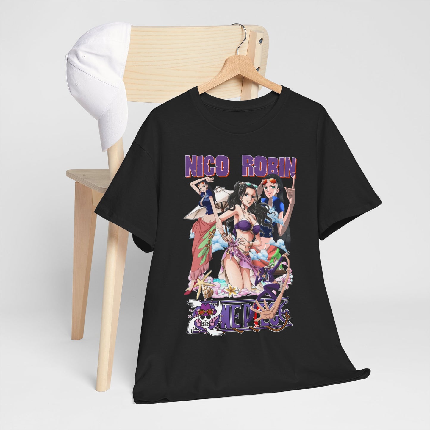 Sleek black t-shirt hung on a minimalist wooden chair alongside a cap, showcasing luxurious anime art of Nico Robin and beach-themed visuals, a perfect blend of style and comfort.