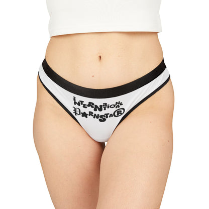 Elegant black and white women's thong featuring artistic lettering of 'International Star' design, exuding confidence and luxury fashion appeal.