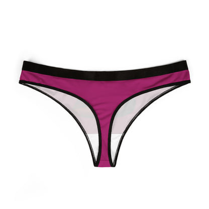 Stylish women's thong in pink with a sleek design, featuring a captivating lip graphic, suitable for adding a cheeky twist to lingerie collections.